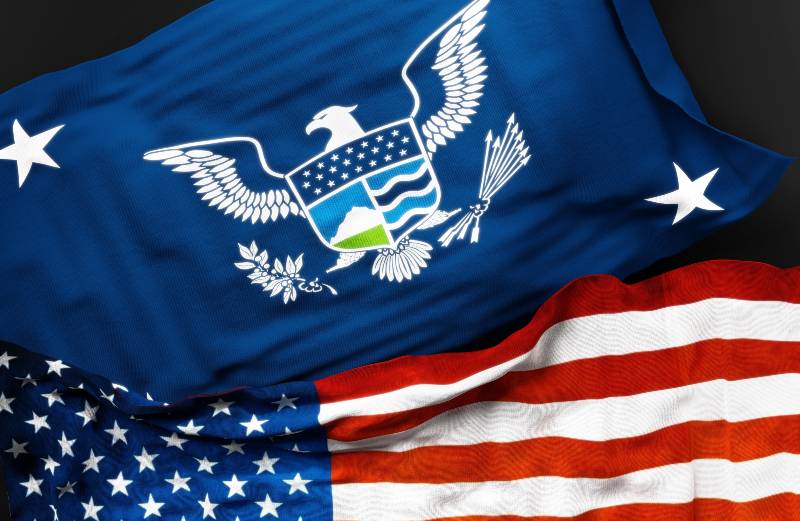 Flag of the United States Secretary of Homeland Security along with a flag of the United States of America | Higgins told DHS Secretary To Resign