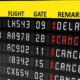 Flight delayed or cancelled display panel in airport | Storms Cancel, Delay Thousands of Flights Over The Weekend | featured