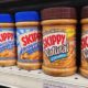 Upclose a Jars of SKIPPY brand peanut butter | Skippy Recalls 80.5 Tons of Peanut Butter Due To Metal Bits | featured