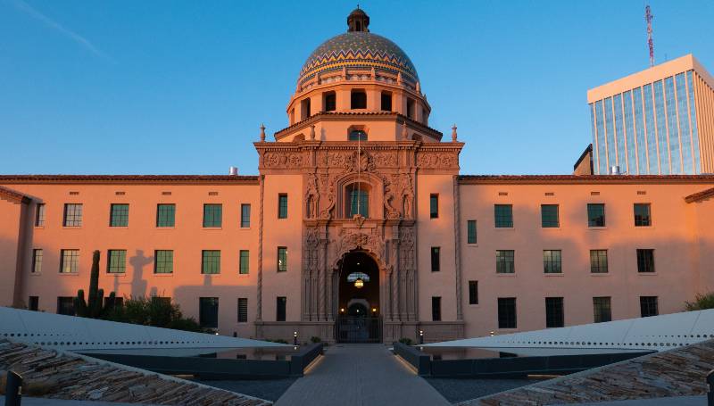 evening exterior view of Historic Pima county courthouse | Arizona Sets Showdown With Courts of Proof of Citizenship Law