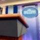 THE WHITE HOUSE sign and podium located in the James S. Brady Press Briefing Room | Jean-Pierre is New Press Secretary, Good Riddance Jen Psaki | featured