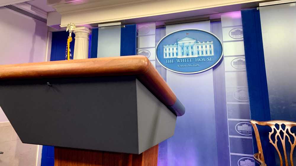 THE WHITE HOUSE sign and podium located in the James S. Brady Press Briefing Room | Jean-Pierre is New Press Secretary, Good Riddance Jen Psaki | featured