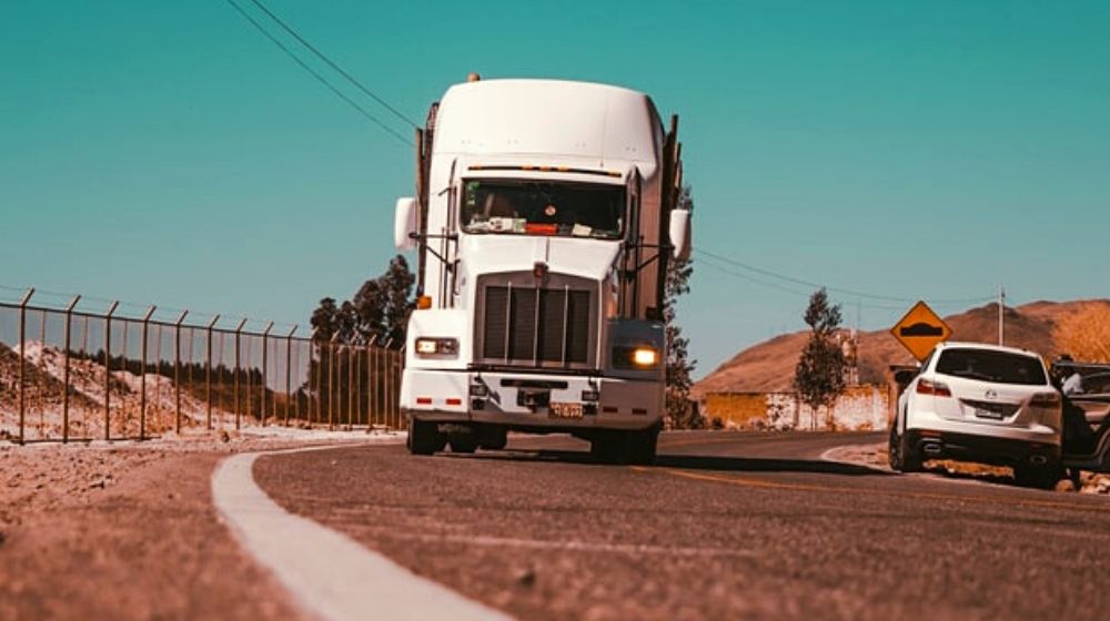 Truck on the road | Truckers Face Challenges as Their Jobs Remain to Be an Essential Service Amid COVID-19 Pandemic | Featured