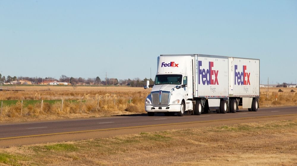 A FedEx Truck-FedEx Ready to Work with New Biden Policies-ss-Featured