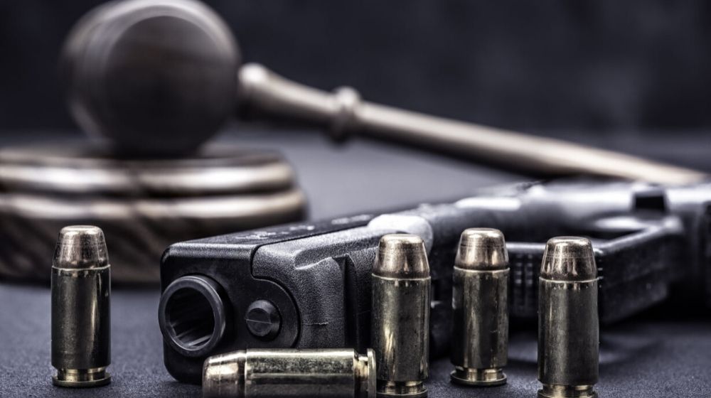 handgun with bullets | Florida ‘Red Flag’ Gun Law Utilized 3,500 Times Since Parkland Attack | Featured