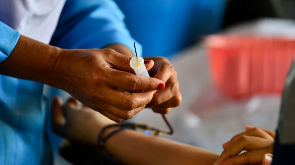 A Nurse Attending to a Blood Donor | Trump Calls on COVID-19 Survivors to Donate Blood Plasma | Featured