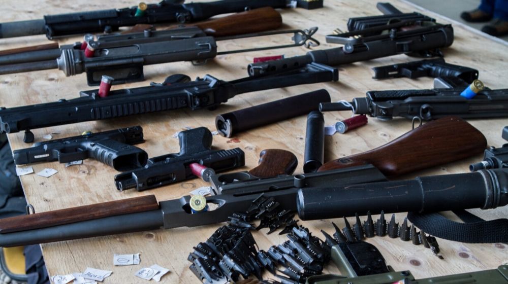 different kind of guns on the table | Virginia Democrats Reject Assault Weapon Ban | Featured