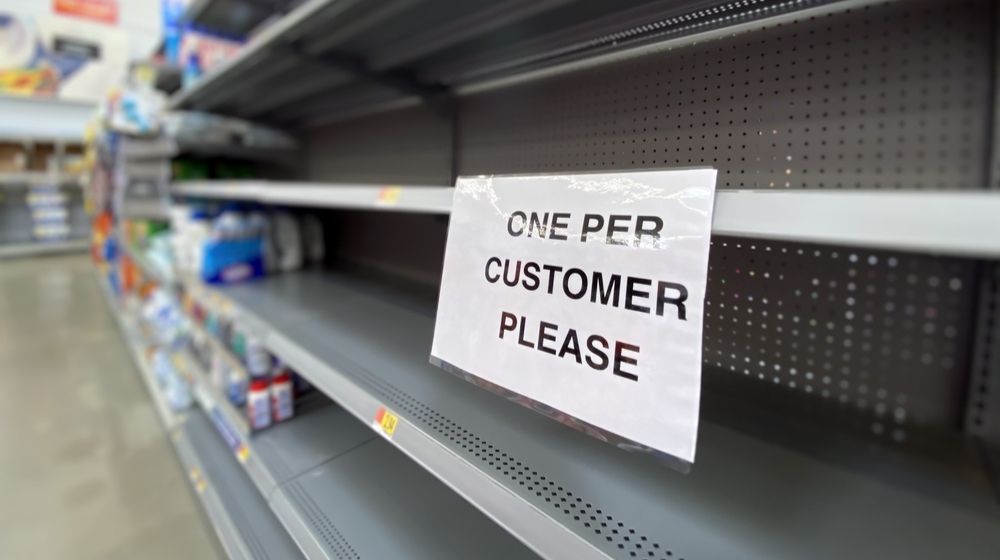 Empty shelves in a supermarket | Police Tries to Identify Walmart Shopper Who Sprayed Cashier’s Eyes with Lysol Disinfectant | Featured