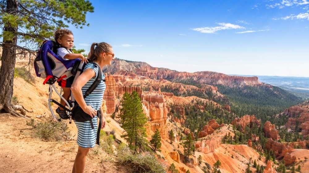 A woman and her child-Dads Required to Pay Half of Pregnancy Costs Under New Utah Law-ss-Featured
