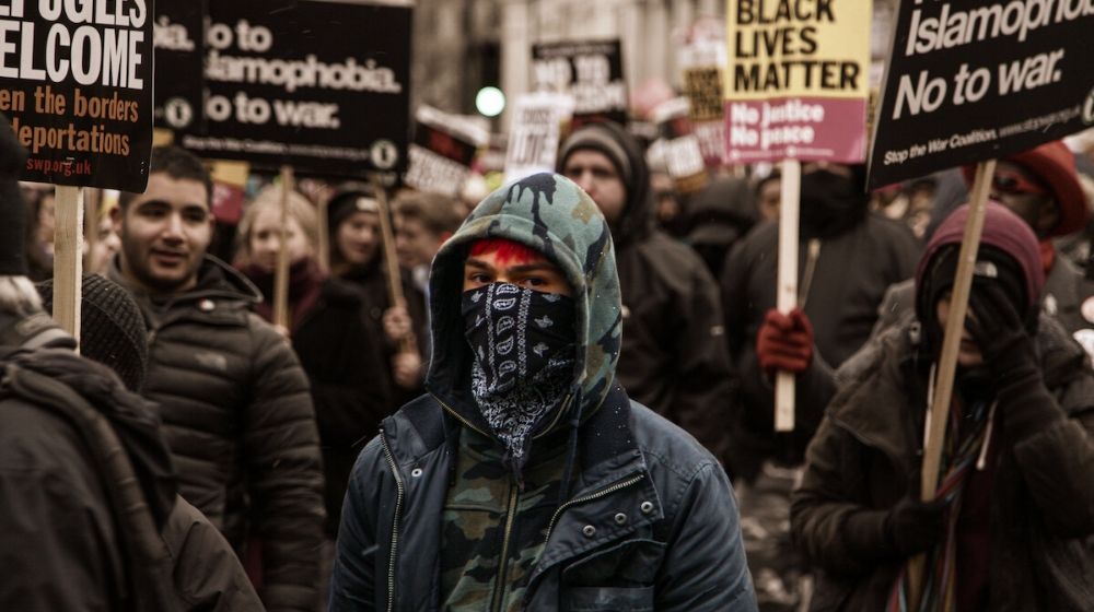 Antifa protestor | Antifa Plans Massive Protests in NY Subways Ending Police Presence | Featured