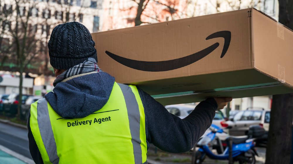 Amazon Prime delivery agent during his work shift-COVID-19 Vaccine Efforts-ss-featured