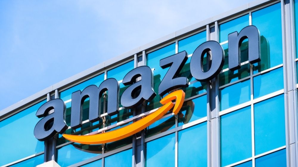 Amazon Logo on the Facade of Their Corporate Office Building | Consumer Watchdog Group Accuses Amazon of Price Gouging – with Markups from 76% to More Than 1,000% | Featured