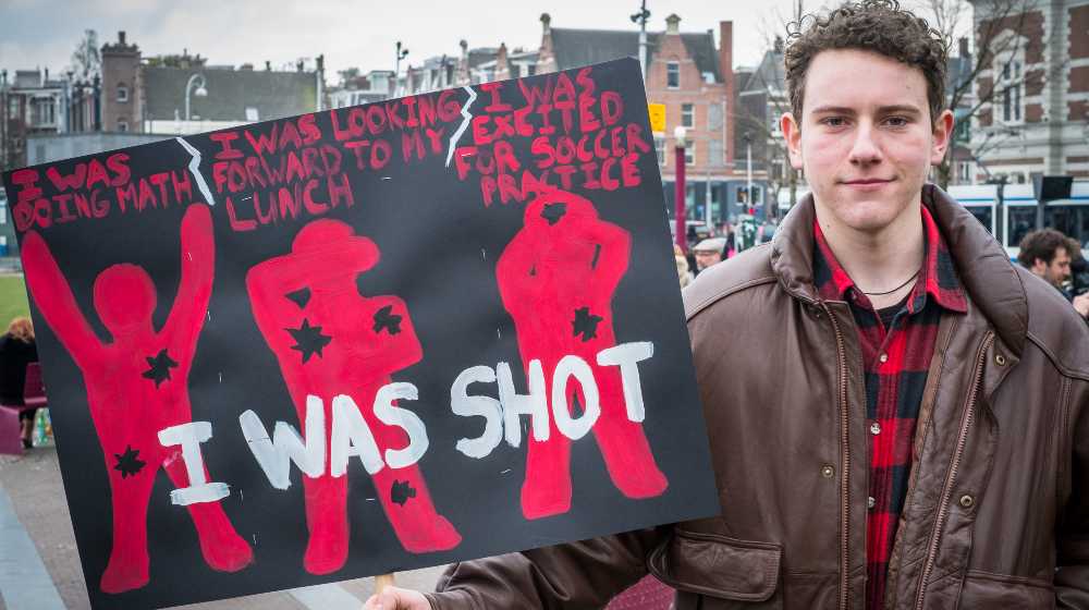 American students who are calling for stricter gun control in the U.S. | 51% Of Americans Say Stricter Gun Control Won’t Stop Shootings | featured