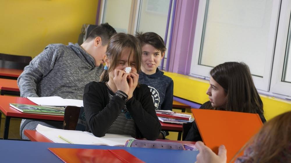 An ill girl in school-Schools Ignoring Teacher Safety- Over 780 Covid-19 Complaints -ss-Featured
