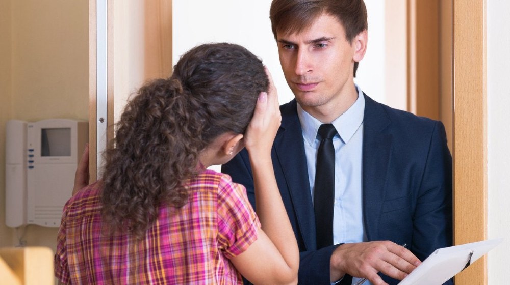 Angry man collector and scared girl standing doorway-Rental rates-SS-Featured