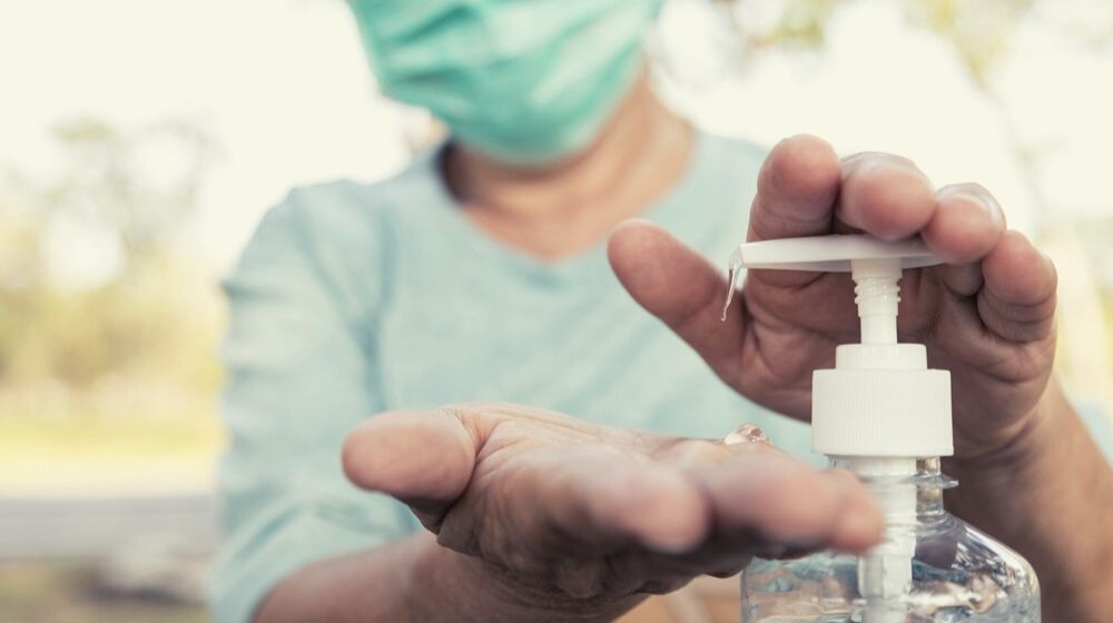 Asian Elderly People Wearing Protective Mask Sanitizing Hands | FDA Warns Consumers About Alcohol-Based Sanitizers That Look Like Food or Drinks | Featured