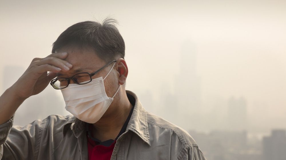 Man with face mask | China’s Coronavirus Outbreak is Human-to-Human Transmitted | FEatured