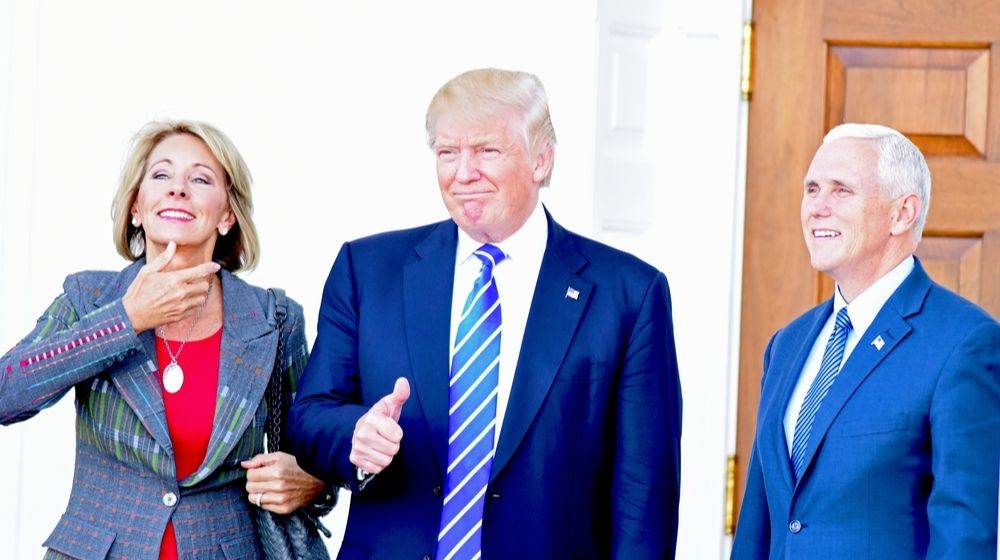 Betsy DeVos with President Trump and Vice President Pence-DeVos Tell Staffers- Resist Changes Under Biden-ss-Featured