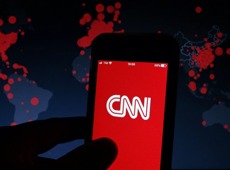 CNN logo displayed on a smartphone | CNN+ Shuts Down Weeks After It Went Online