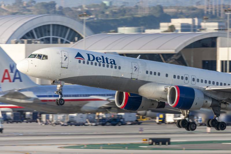 Delta Air Lines Boeing 757 taking off from Los Angeles International Airport | Delta First US Airline To Pay Flight Attendants for Boarding Duties