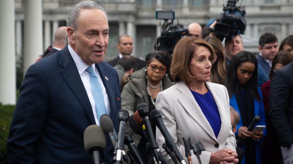 Democratic Congressional Leaders | Dem Lawmakers Ripped for African Garb Stunt | Featured