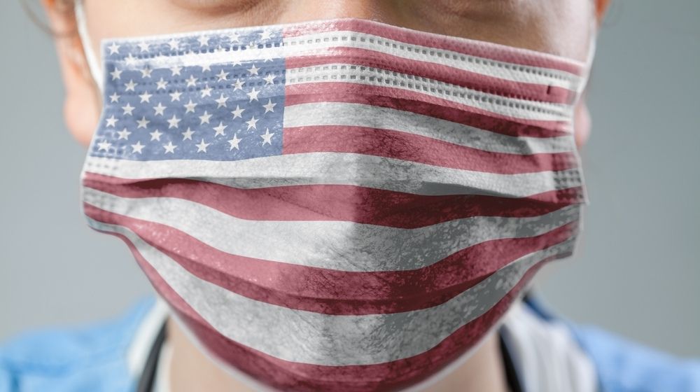 Doctor Wearing Protective Medical Textured Mask Flag of The United States | US Can't Leave the WHO Fast Enough | Featured