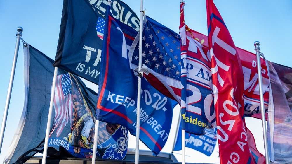 Flags showing support for former President Trump-Poll- Majority of Republicans Would Leave GOP To Join Party Founded by Trump-ss-featured