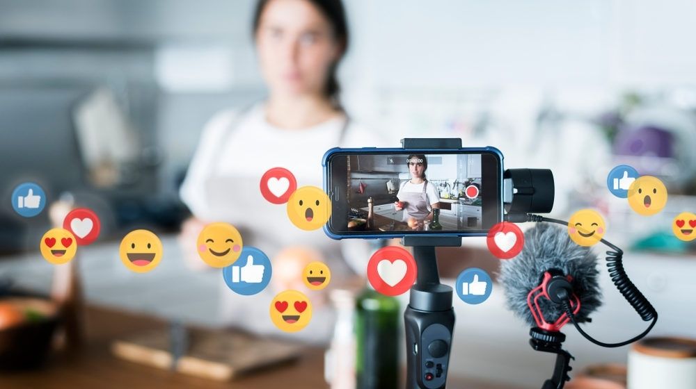 Food Vlogger Recording a Video | Social Media Influencers Promote Retail Sales as People Stay at Home | Featured