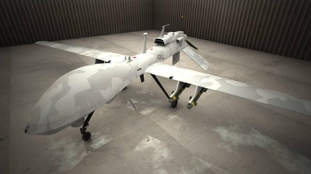 Gray Eagle military drone on wet backyard of airbase. Armored with hellfire missiles | French Uses Drone Strike to Kill Top ISIS Leader in Africa | featured