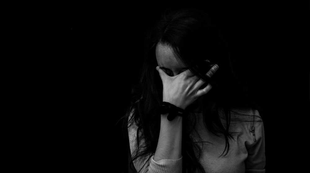 Grayscale Photography of a Woman Touching Her Eyes | Post-Election Grief is Real, and Here are 5 Coping Strategies – Including Getting Back into Politics | Featured