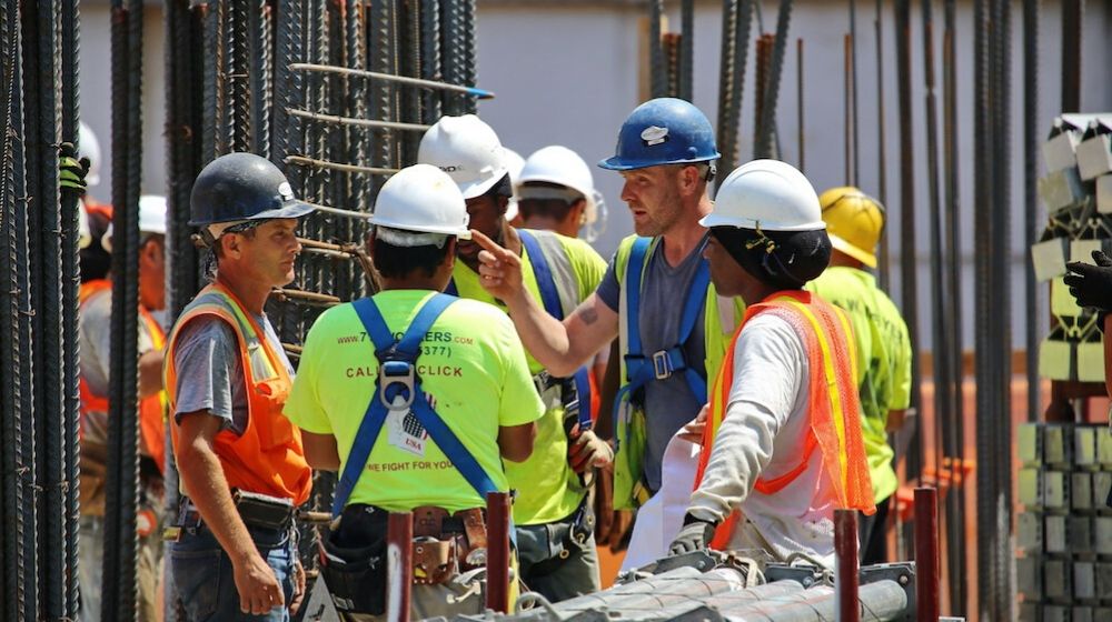 Group of Workers | US Gains a Robust 266,000 Jobs; Unemployment Drops to 3.5% | Featured