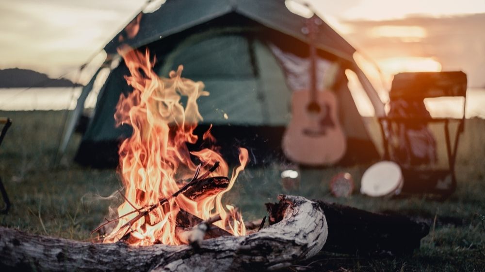 Campfire at a Campsite | Outdoor Experts Give Tips and Share Estimates of Camping Costs | Featured