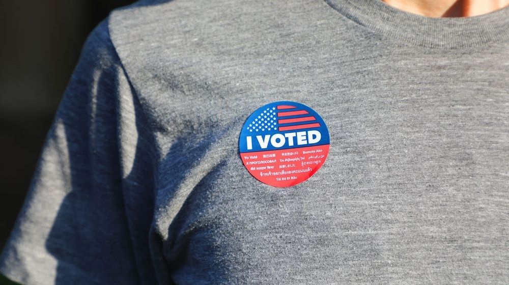 I Voted Sticker on Gray Shirt | 3 Days Post-Election: When Can We Expect a Result? | Featured