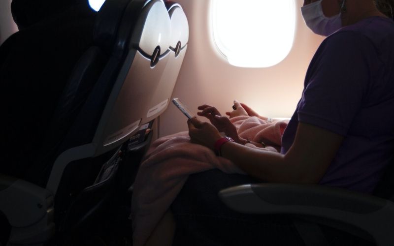 Airplane Passenger Wearing Mask | FDA Warns Consumers About Alcohol-Based Sanitizers That Look Like Food or Drinks