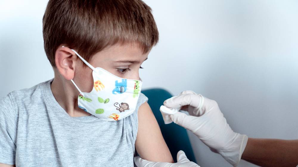 Injection of pfizer vaccine into a 5 year old Caucasian child | Pfizer Asks Emergency Use Authorization To Vaccinate Kids | featured