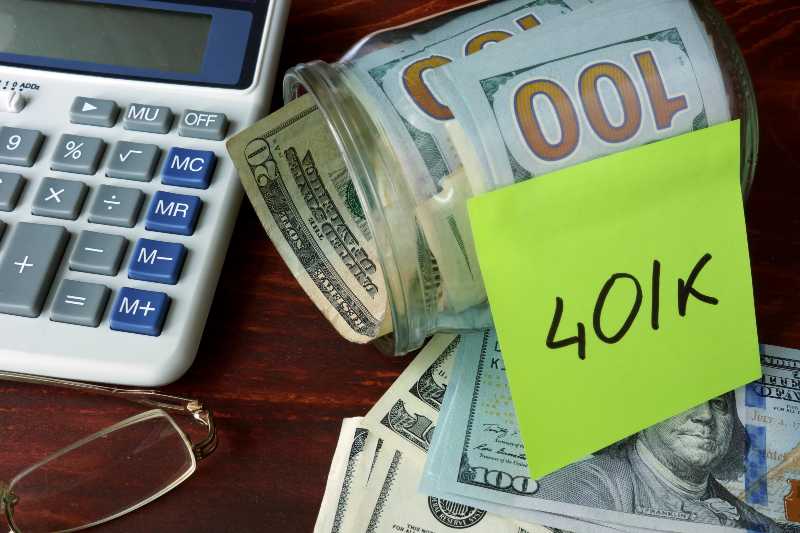 Jar with label 401k and money on the table | How a Gold Bull Run Is Setting Up Beautifully for 401k and IRA Holders, As Well As Retirees