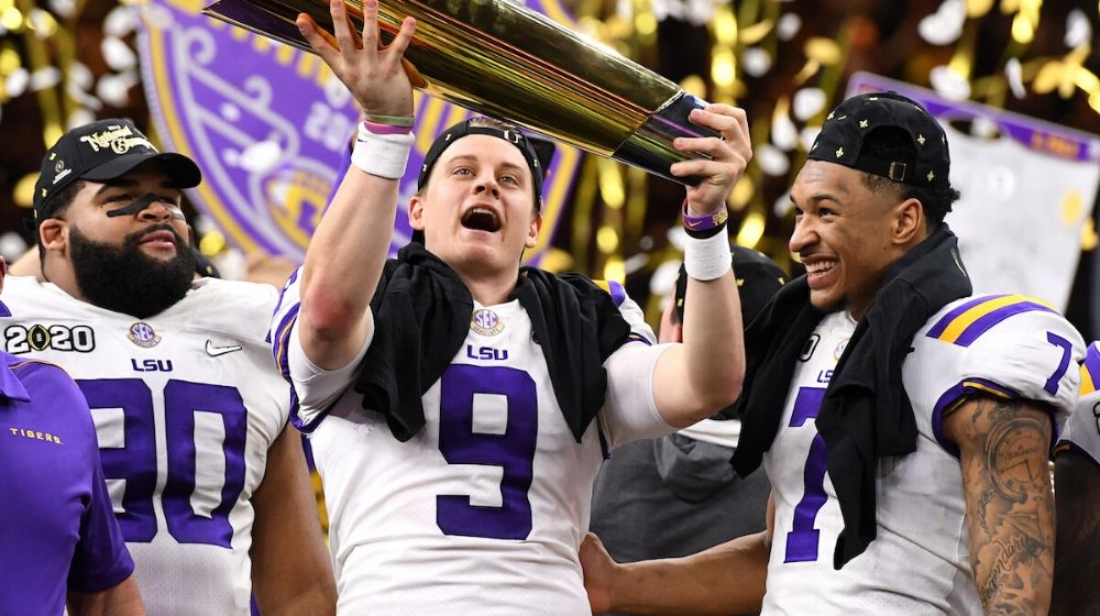 LSU Tigers National Champions holding their trophy | White House: Trump Honors National Champions LSU Tigers | FEatured