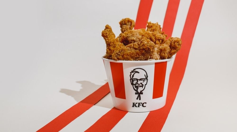KFC Fried Chicken Bucket | KFC Drops “It’s Finger Lickin’ Good” Slogan Amid COVID-19 Pandemic: “Right Now, Our Slogan Doesn’t Feel Quite Right” | Featured