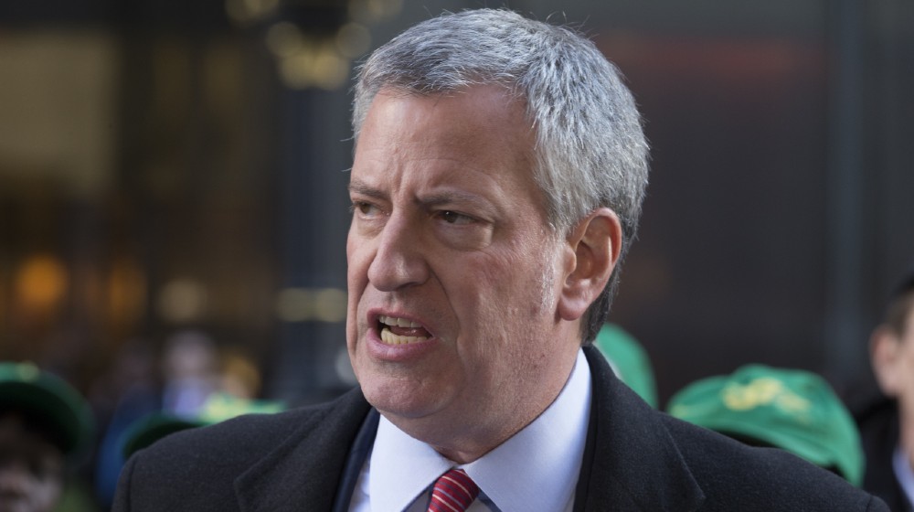 Mayor Bill de Blasio speaks at rally against GOP tax bill in front of Trump Tower on 5th Avenue-Cancel Trump Business Contracts-ss-featured