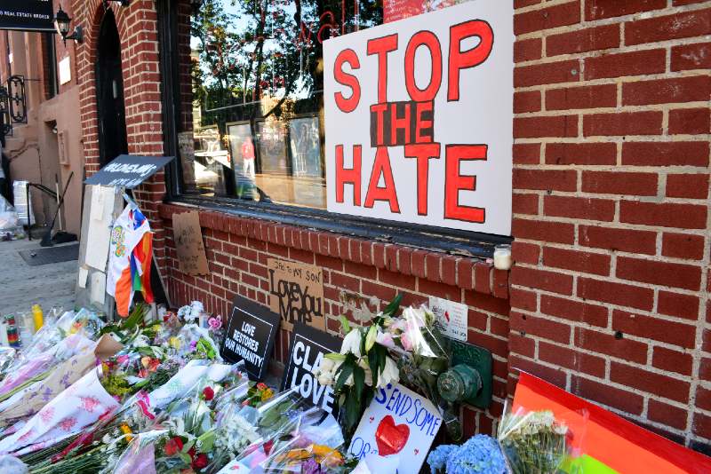 Memorial outside the landmark Stonewall Inn for the victims of the mass shooting in Orlando-Denying-ss