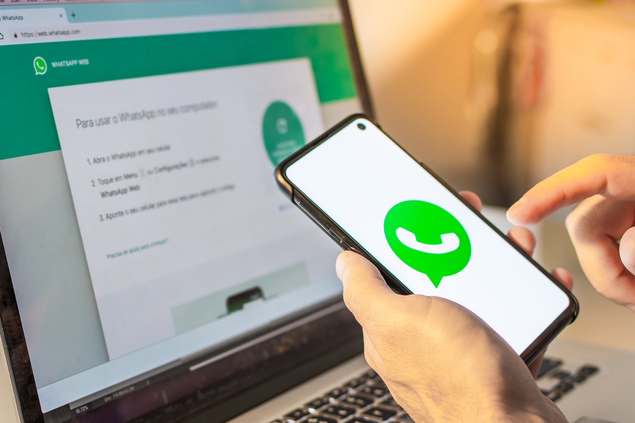 Mobile Smart Phone Device With Whatsapp Company App Logo on Screen and a Notebook with Whatsapp Web Application on Internet Browser-SS-Lost Millions of Users