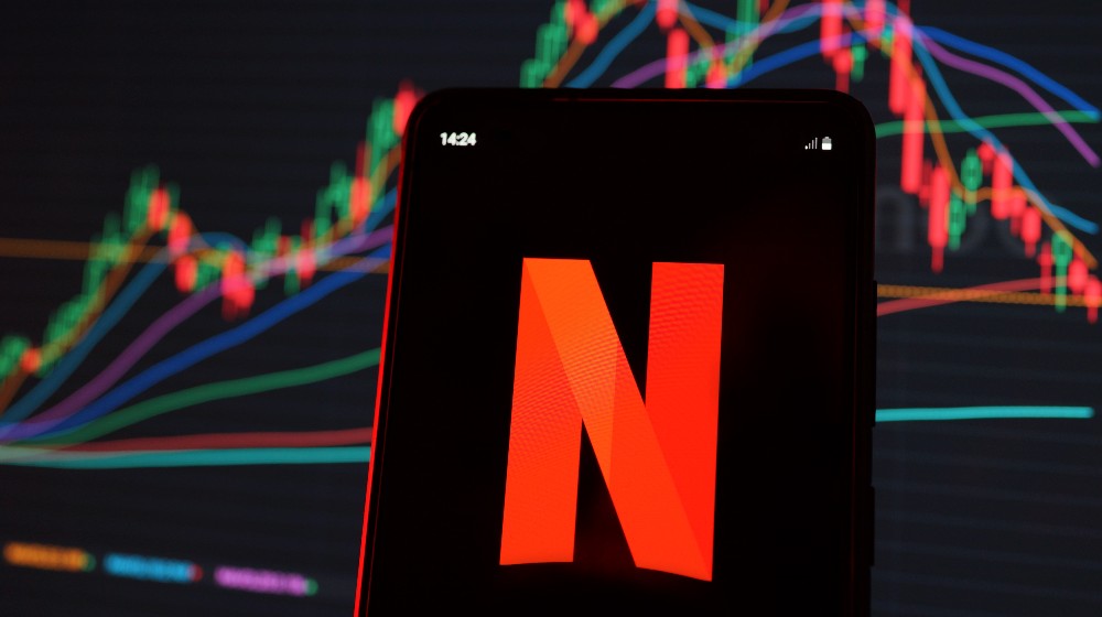 Netflix stock index is seen on a smartphone screen | Netflix Stocks Lose $50 Billion As Subscribers Quit | featured