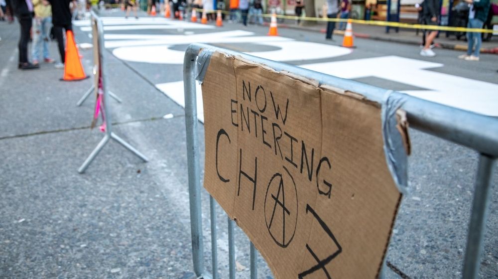 Now Entering CHAZ sign with an Anarchist Symbol | One Dead, One in Critical Condition in Early Morning Shooting at Capitol Hill Protest Zone Known as CHOP | Featured