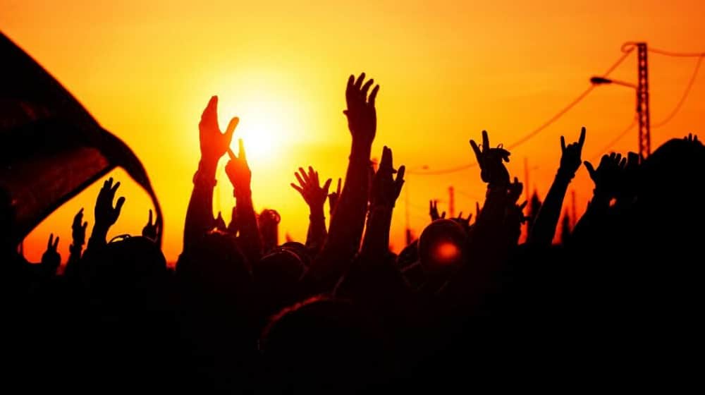 People raising hands | Will The Impeachment Inquiry Rally Trump’s Base? | featured