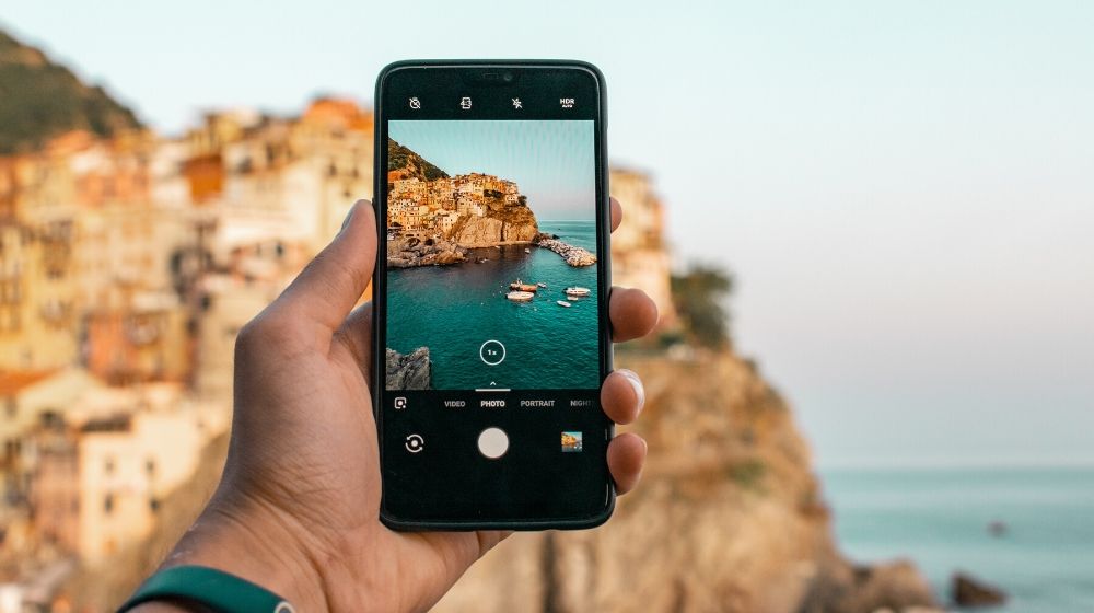 Phone | How to Make Money Traveling | Featured