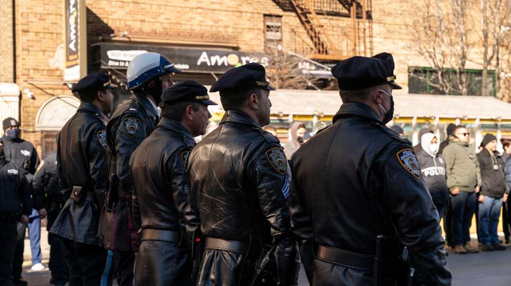 Police officers gather to pay tribute to fallen police officer Wilbert Mora | More Cops Killed In the Line Of Duty During Biden’s Term | featured