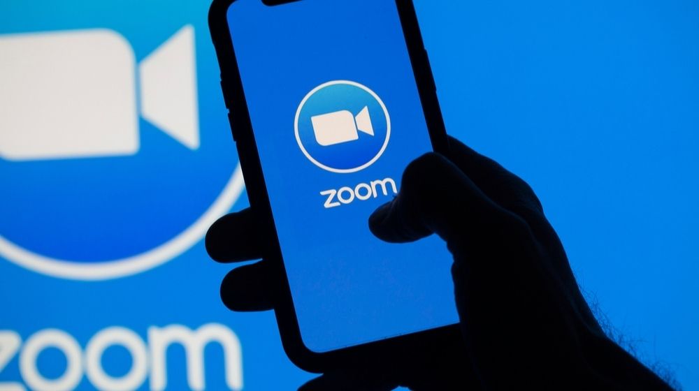 Popular Zoom Video Conference App icon on a Mobile device | Zoom Users Experience “Partial Outages” Days After App’s Expansion | Featured