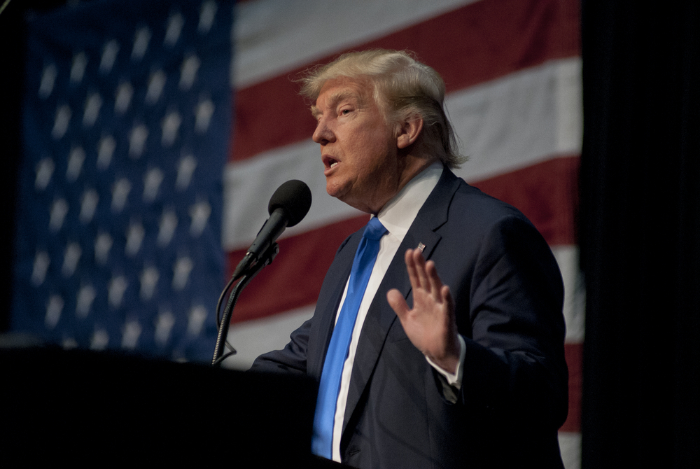 President Donald Trump talking to a crowd of supporters in Iowa