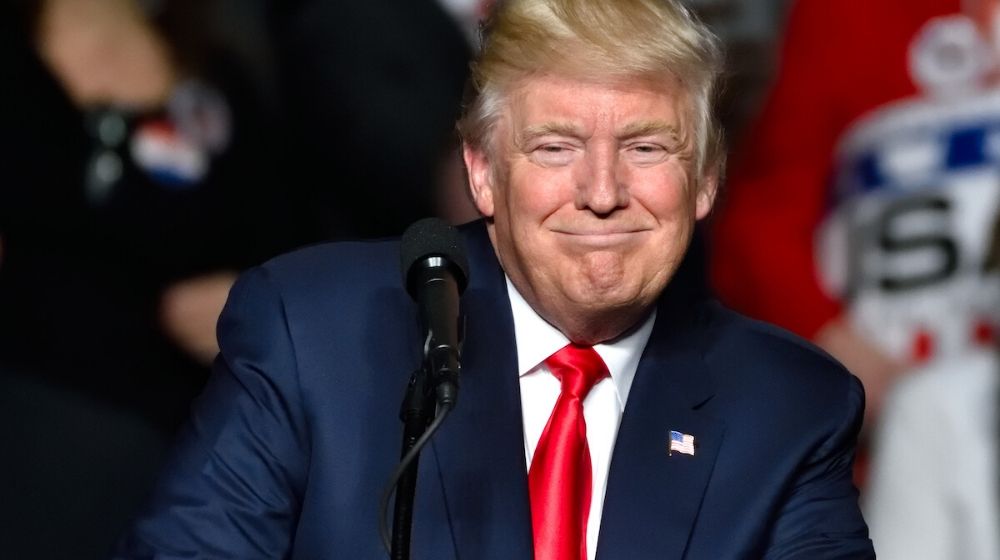 Donald Trump smiling | OPINION: Democrats Have Made Donald Trump Stronger | Featured