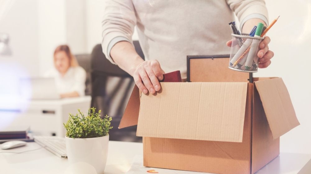 Dismissed Worker Taking his Office Supplies with Him | Weak Demand Forces U.S. Employers to Dismiss Workers | Featured